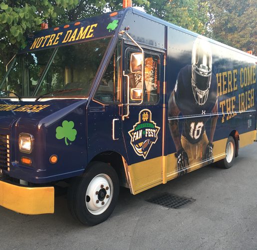 Notre Dame Here Come the Irish wrapped tour truck built by Martin Sports Productions