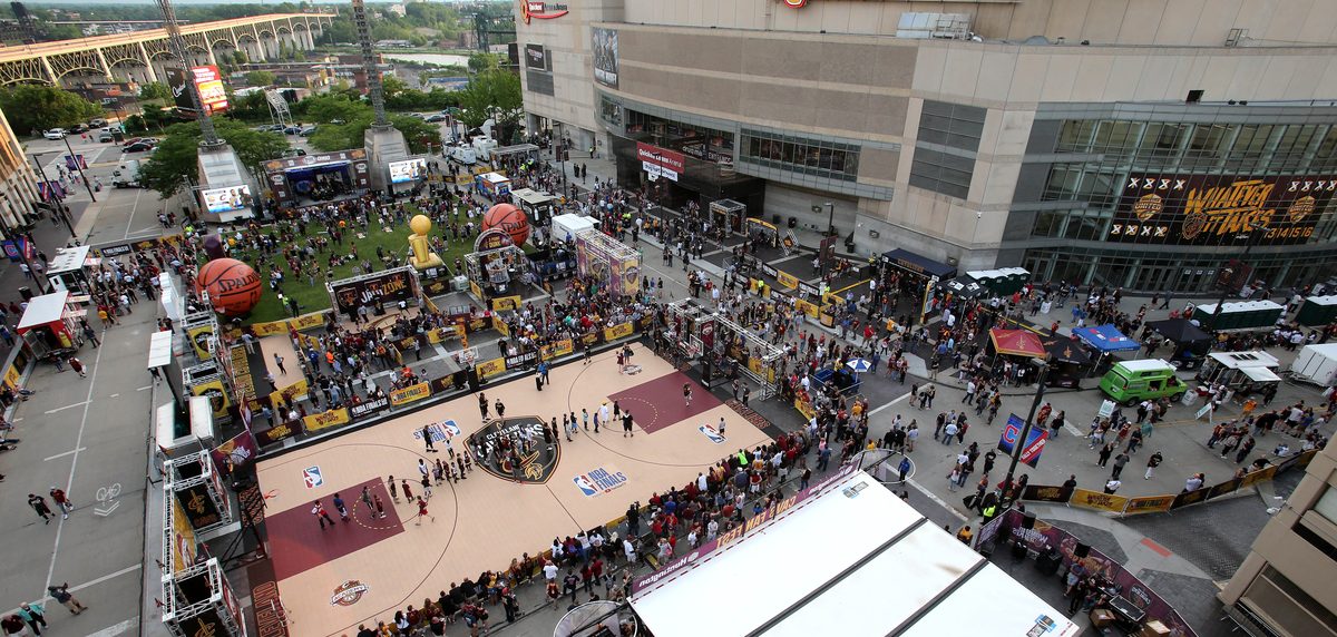 Aerial view of the outdoor Cavs Fan Fest build outside the arena, including a full-size NBA Finals court