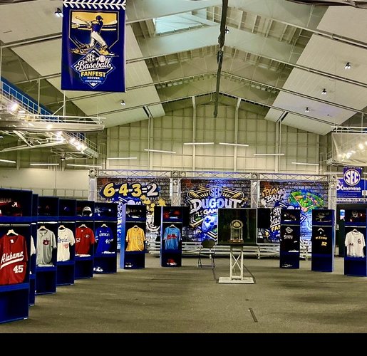 All sixteen SEC schools on themed jersey displays under FanFest banners